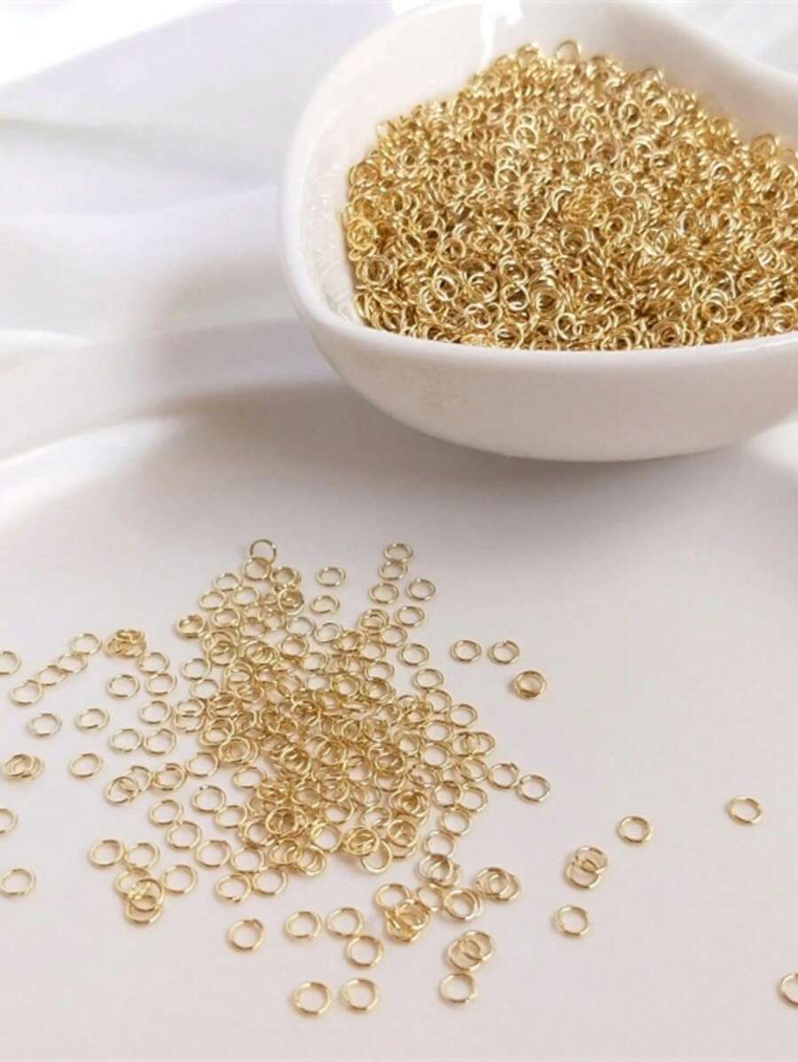 Aproximadamente 100 piezas de anillos divididos abiertos de acero inoxidable dorados y plateados para hacer joyas DIY, collares, pulseras y otros conectores
