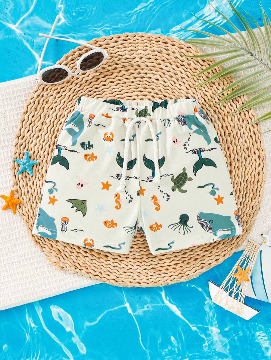 Short de plage à taille élastique avec imprimé requin pour tout-petits garçons, adapté pour les vacances et les voyages