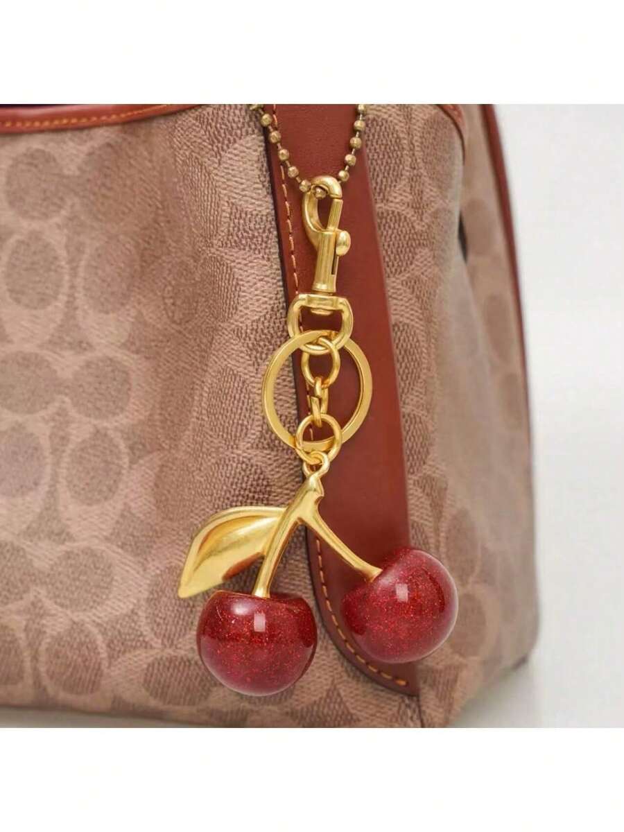 1 Stück Kirschanhänger, neuer großer Kirsch Kristall Anhänger, Schlüsselanhänger mit funkelndem Kirsch Charm mit Clip, glänzender Harz und Metall Accessoire, passend für Frauen Geldbeutel und Tasche (klein) Autoaccessoires Taschenbaumler Rucksack für die Schule