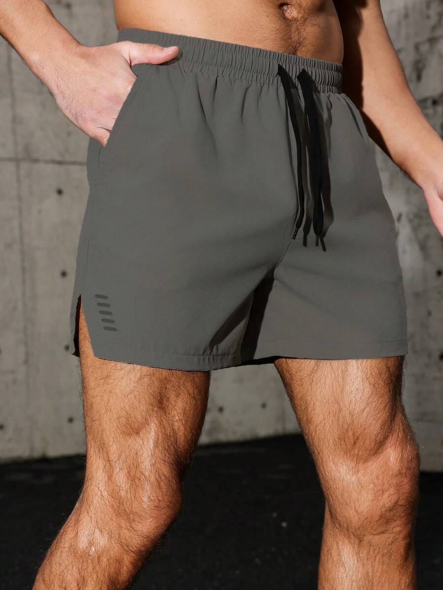 Pantalones cortos deportivos para hombres de secado rápido y elásticos con múltiples bolsillos para actividades al aire libre