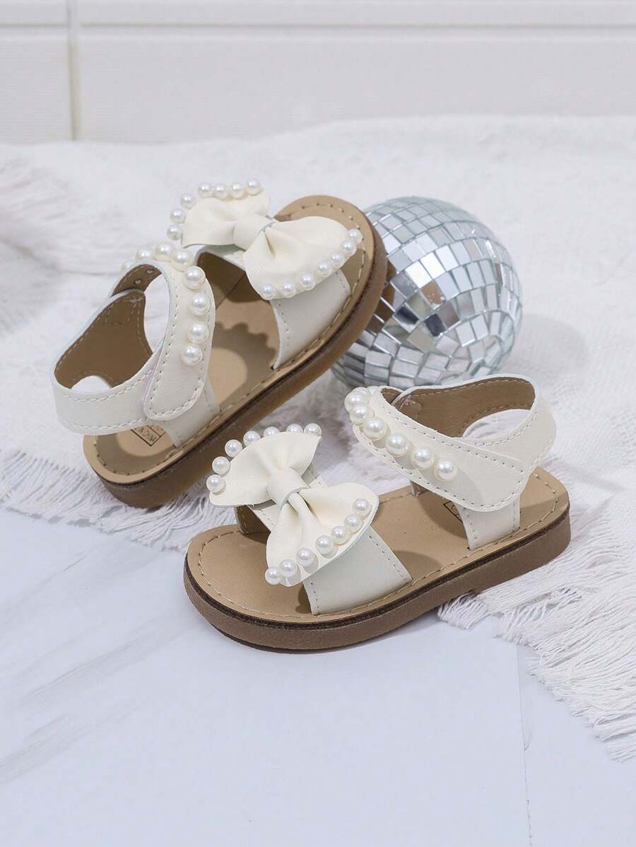 1 Pair Girls' Solid Color Open Toe Bowknot Pearl Hook And Loop Sweet Princess Style Flat Sandals, Non-Slip And Breathable, Suitable For Summer