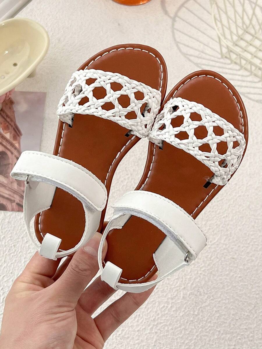 Sandalias planas para niñas de estilo sencillo y de moda, con decoración de cinturón tejido de material, sin puntera abierta, de suela plana y con cierre de gancho y bucle, adecuadas para uso diario, viajes, juegos de verano, actividades en la playa y otras ocasiones