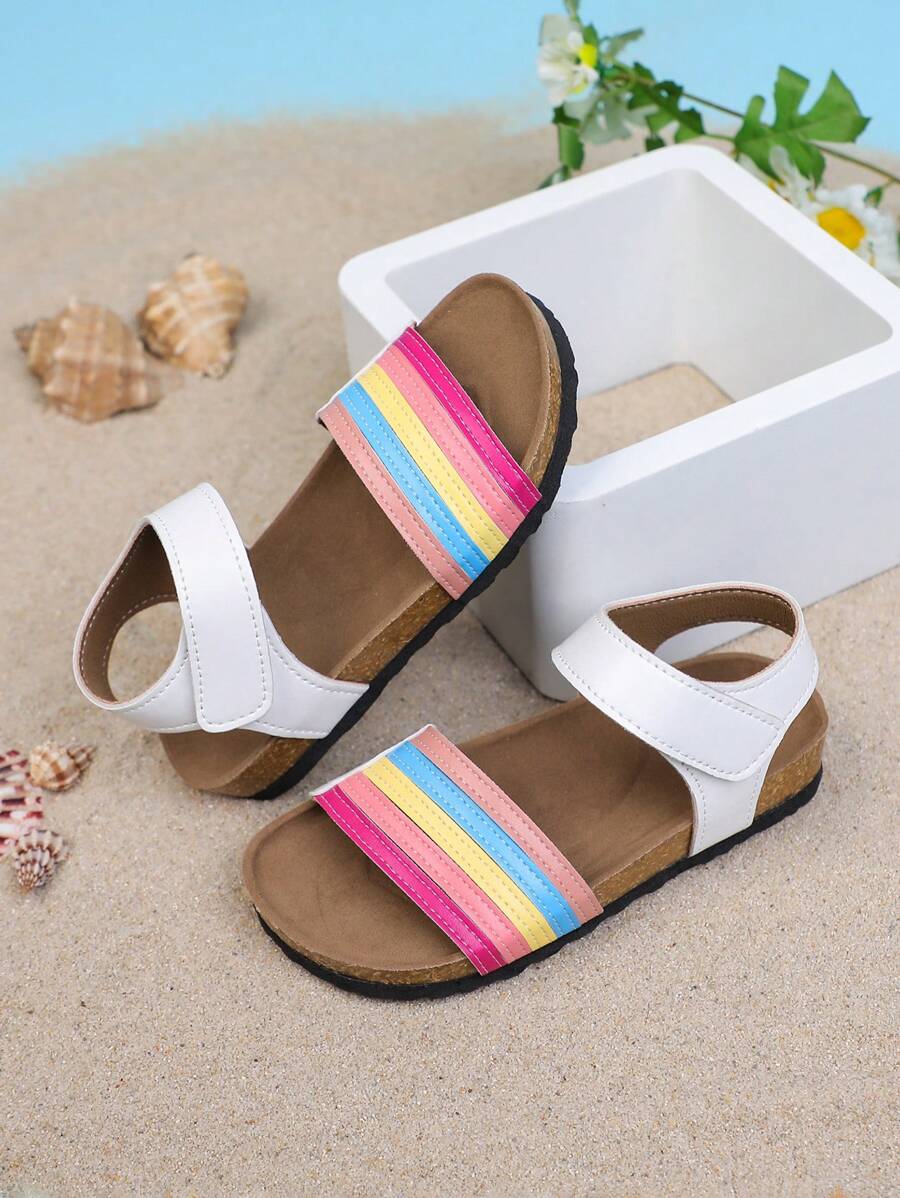 1 par de nuevas sandalias planas de moda para niñas con decoración arcoíris, versátiles para usar en exteriores, viajes y días festivos