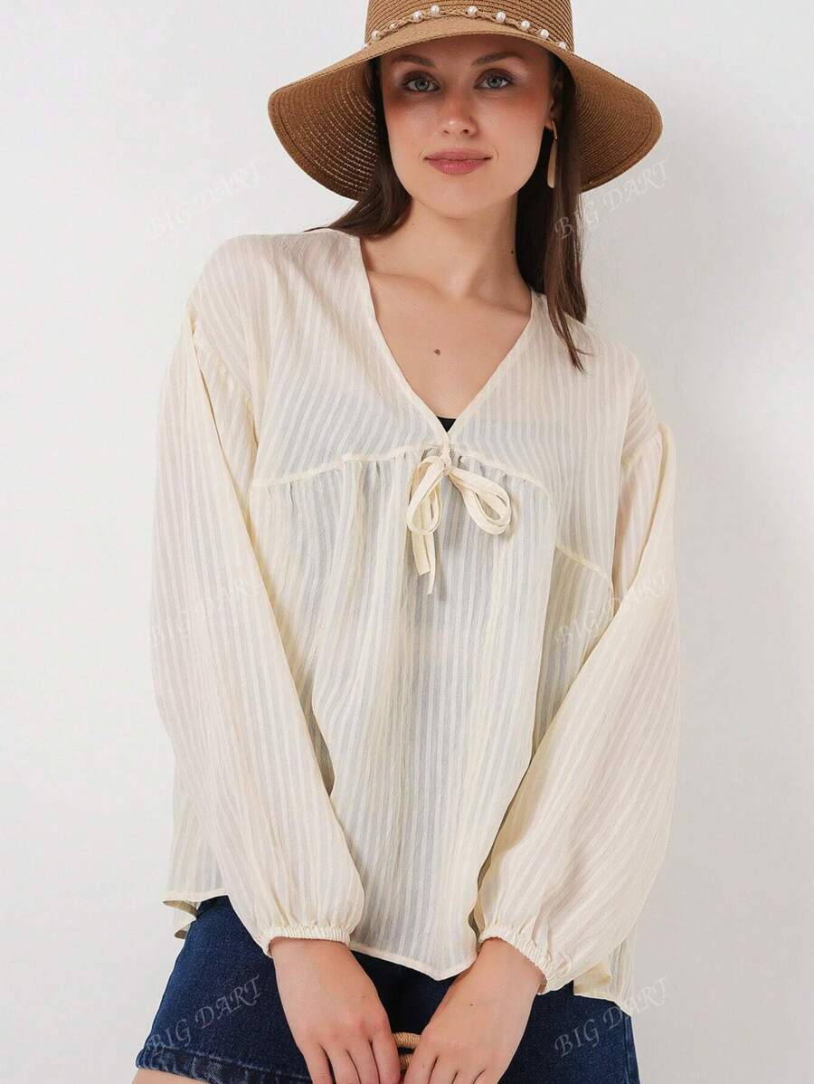 Blusa donna elegante con collo lavorato a costine annodata, tinta unita, adatta per il mare