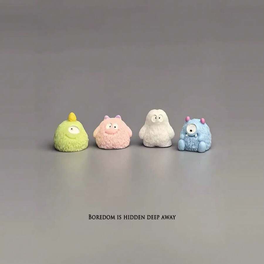 Un conjunto de ornamentos lindos y creativos de pequeños monstruos animales peludos y de paisajes de micro caricaturas divertidas, artículos de decoración del hogar, decoraciones para escritorio y automóvil