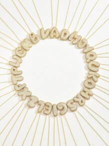Gold-Großbuchstaben