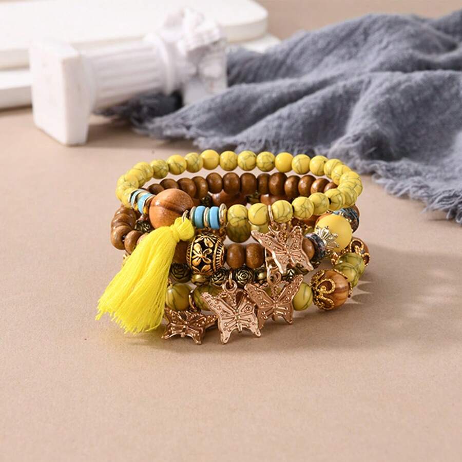 Conjunto de 4 pulseiras criativas Boho multicamadas com pingente de borboleta e borla, joias da moda para presente