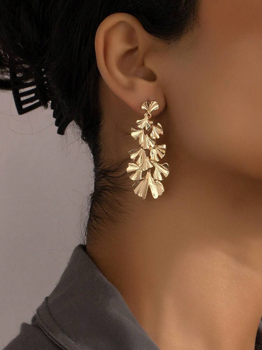 1 par de pendientes con diseño de hojas geométricas en capas metálicas, estilo elegante
