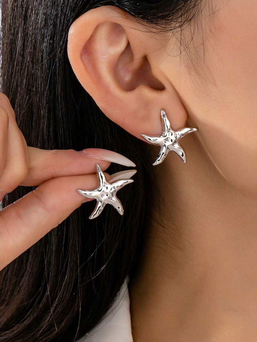 1 par de pendientes minimalistas elegantes y de moda con forma de estrella de mar