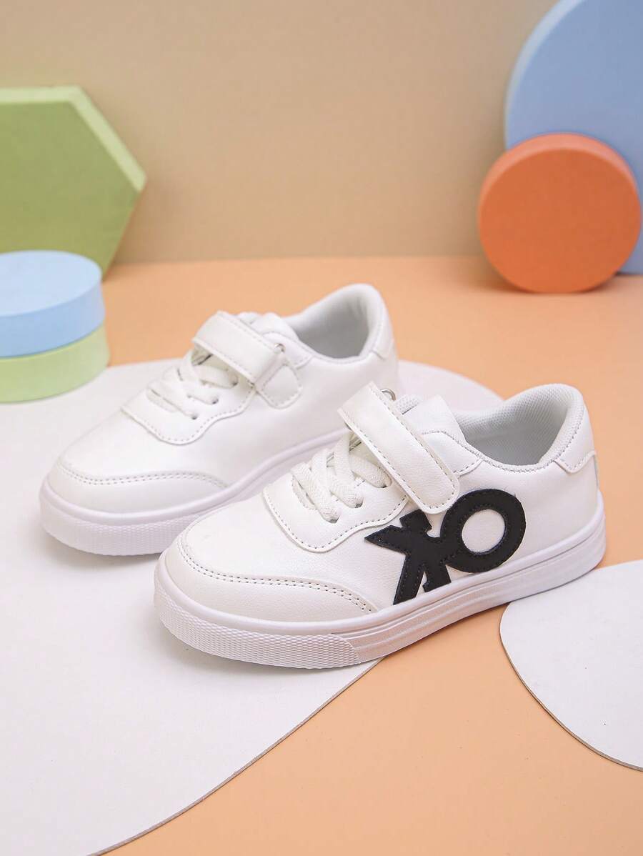 Zapatos deportivos infantiles con cierre de gancho y bucle de estilo casual y neutro, adecuados tanto para niños como para niñas, con diseño de estrella en la suela, muy apropiados para la temporada de regreso a clases
