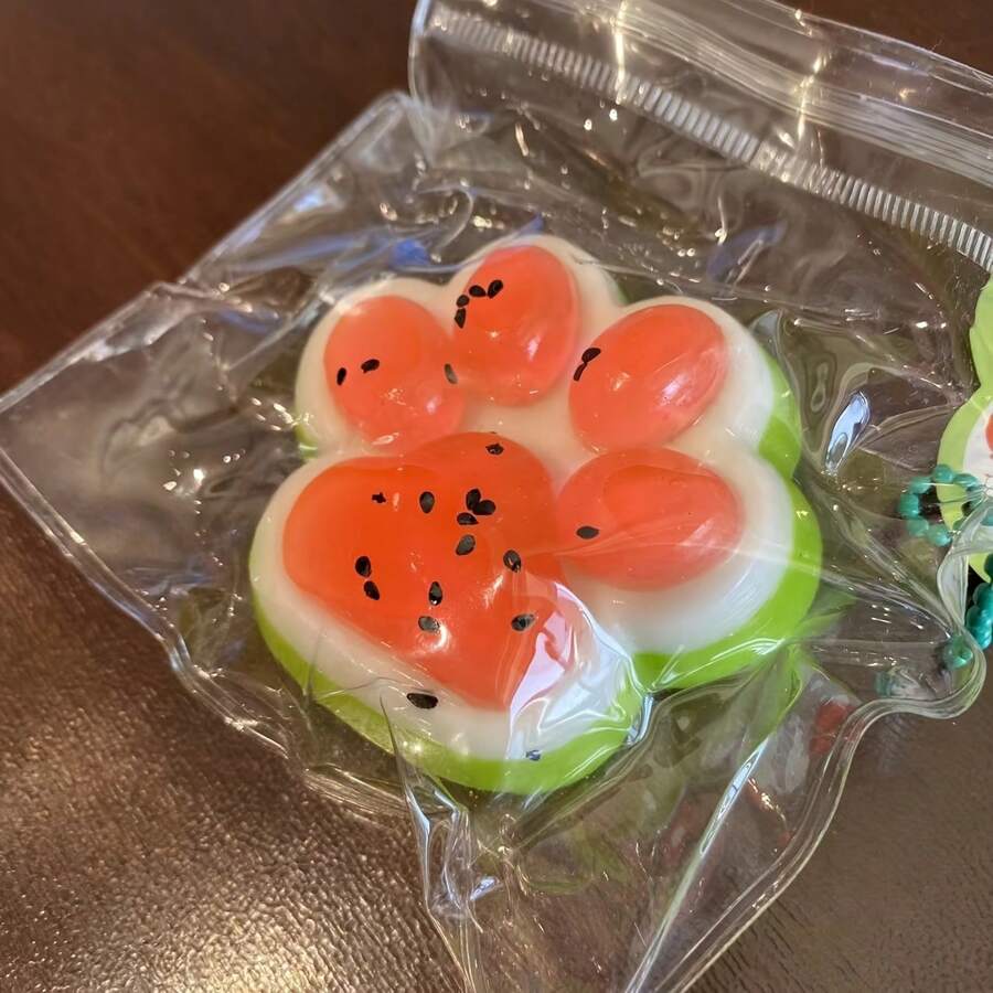 1 pieza Juguete de apretón con diseño de pata de gato de sandía - TPR de rebote lento, diseño de pata realista, divertido y molesto, perfecto para regalos de Navidad/Día de San Valentín/Cumpleaños