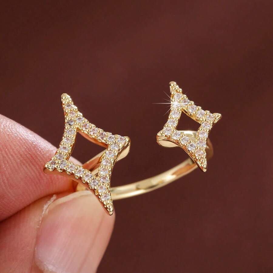 1 pieza Anillo con estrella de cuatro puntas ajustable y circonita cúbica de moda para mujer