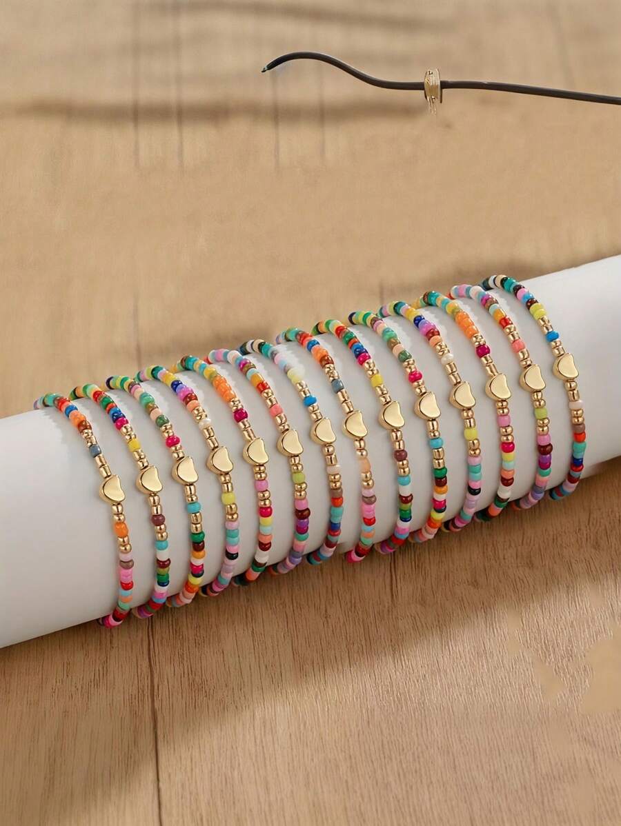 Conjunto de 14 piezas de pulseras de estilo bohemio con cuentas de arroz de colores, con encanto de corazón, cadena elástica de cuentas para mujer como regalo de joyería