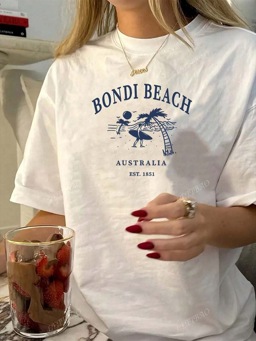 maglietta estiva di moda a stampa con motivo da spiaggia e surf, taglie comode per donna