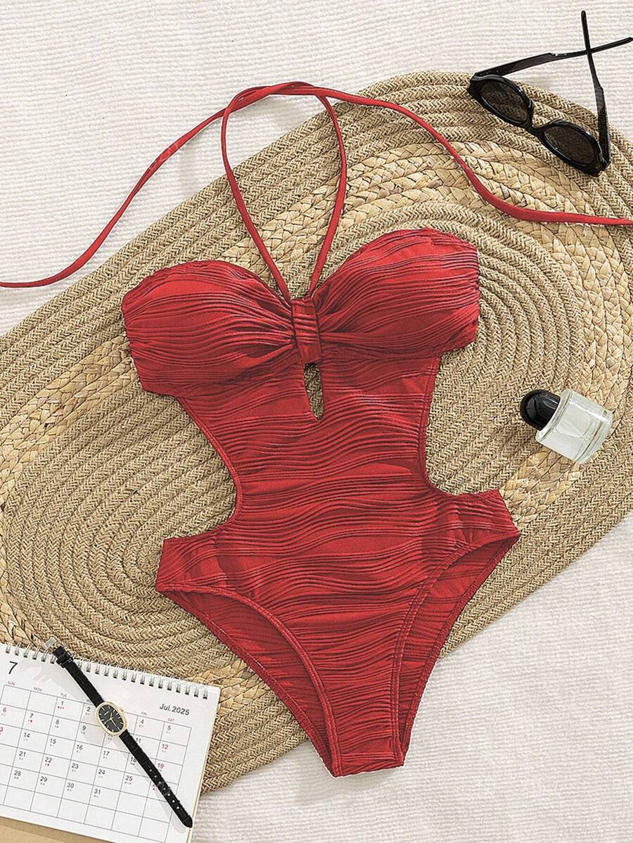 Costume da bagno intero da donna alla moda con taglio sulla vita e scollo a canottiera