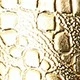 motif crocodile doré