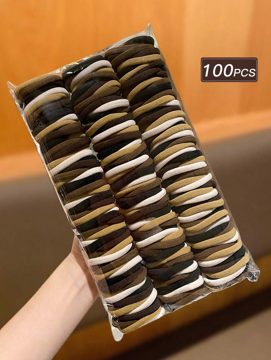 100 pièces Élastiques à cheveux souples, simples et à la mode en noir et marron pour femmes. Convient pour un usage quotidien, cadeau, accessoires de gym, attaches à cheveux, accessoires capillaires, supports de queue de cheval, élastiques à cheveux, bandes en caoutchouc pour cheveux