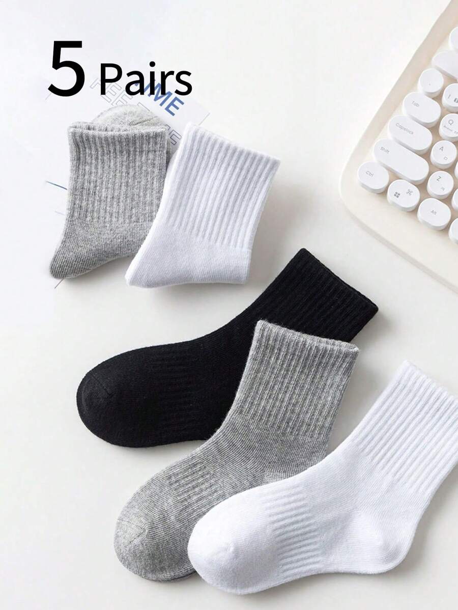 5 pares de calcetines tipo crew para niños y niñas, de unicolor negro/blanco/gris, para todas las temporadas, versátiles para deportes
