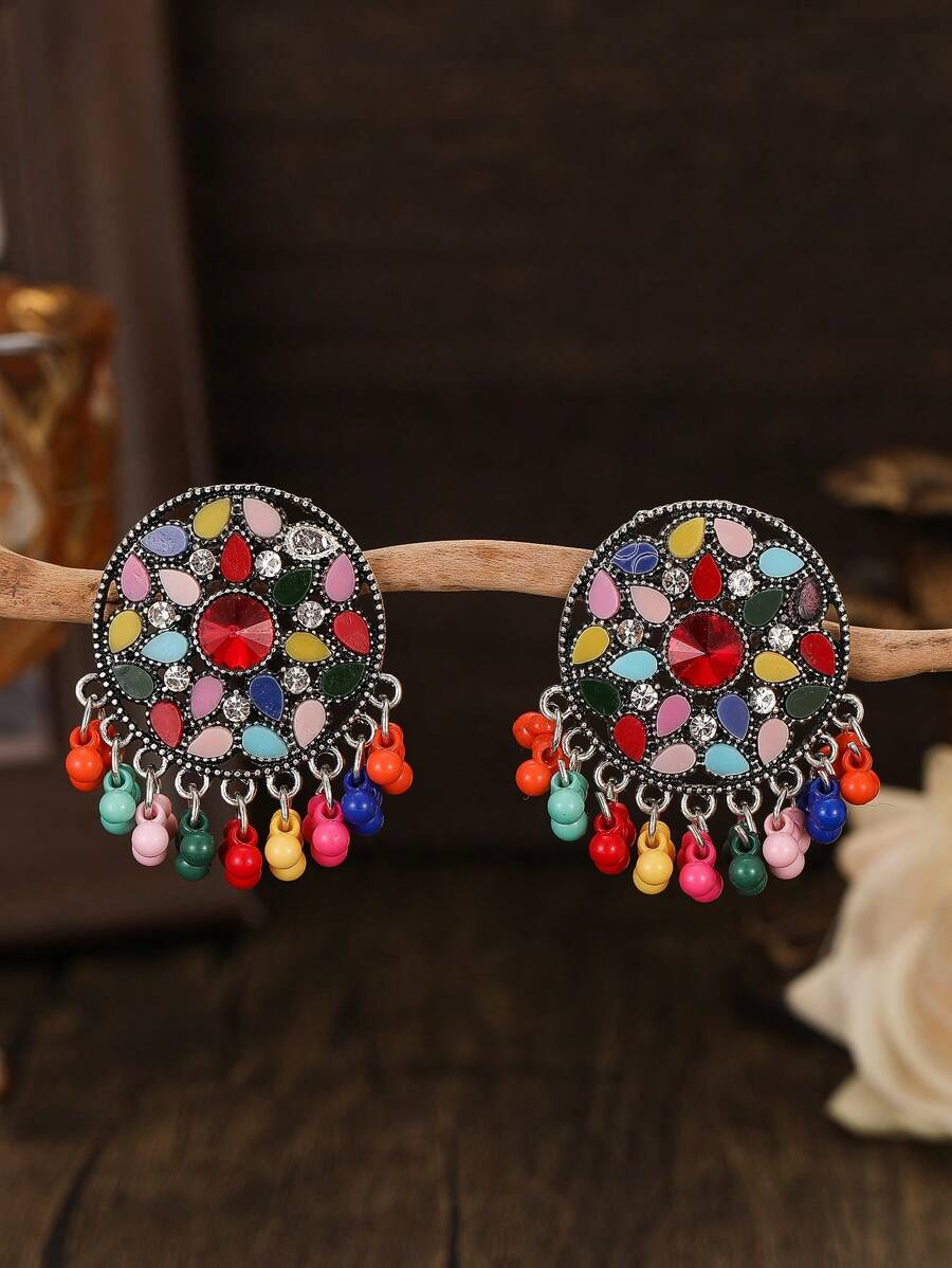 FANYINAN 1 par de pendientes de lujo de estilo retro de Europa y Estados Unidos, de aleación de zinc con diamantes de colores exagerados y exóticos, estilo de corte de lujo para damas