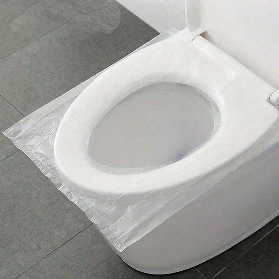 100 Stück tragbare einzeln verpackte durchsichtige Einweg-Toilettendeckel, tragbare Toilettenabdeckung für Reisen, wasserdichte Toilettenabdeckung, tragbare Toilettenauflagen für unterwegs, Haushaltsgegenstände, unverzichtbares Reisezubehör für Geschäftsreisen, Camping, Krankenhäuser, Hotelbetriebe, wenn man öffentliche Toiletten benutzt, um die persönliche Hygiene zu gewährleisten