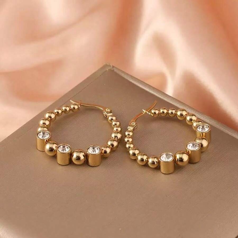 Boucles d'oreilles en acier inoxydable européennes et américaines, boucles d'oreilles de mode haut de gamme décorées de strass plaquées or 18 carats