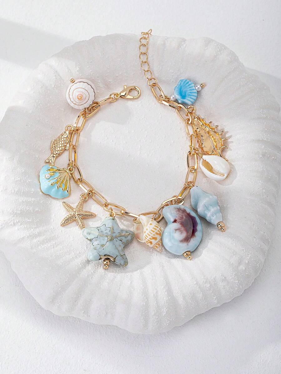 1 pieza Pulsera de estilo playero hecha a mano con múltiples encantos de estrellas de mar, peces, conchas y perlas falsas, accesorio de regalo para vacaciones de verano para mujeres