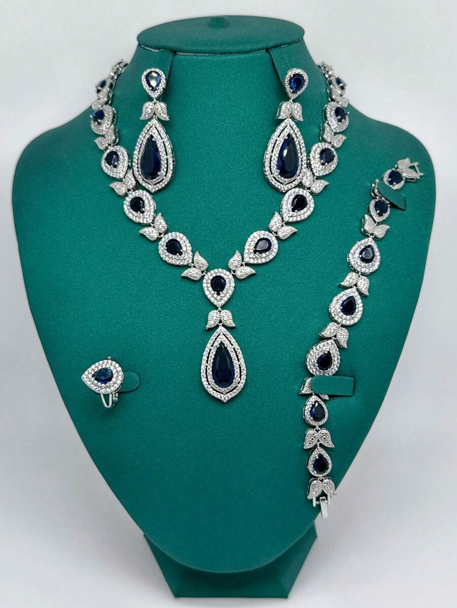4 pièces Ensemble de bijoux de luxe pour femmes comprenant un collier, des boucles d'oreilles, une bague et un bracelet avec zirconium cubique vert. Convient pour les événements formels, les mariages, les mariées et les vacances. Coffret cadeau exquis