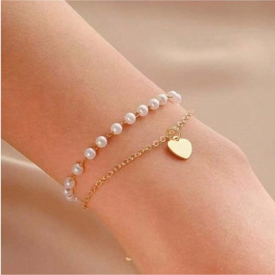 Pulseira feminina versátil com pingente de corrente dupla e pérolas artificiais, ideal para deslocamentos, dia a dia e encontros