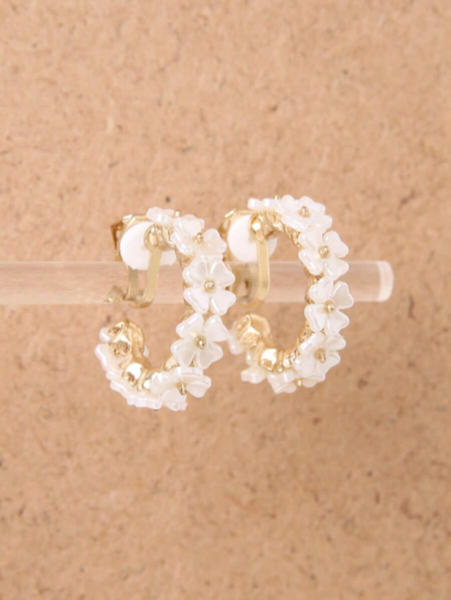 1 paire de boucles d'oreilles clip-on en forme de fleur pour femmes, accessoire mode minimaliste polyvalent
