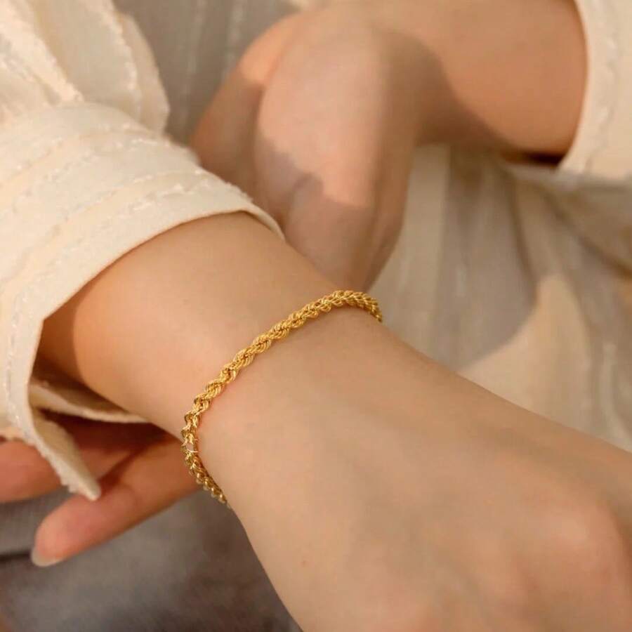 1 pieza Pulsera de acero inoxidable de color dorado con cadena trenzada, accesorio versátil de uso diario para mujeres