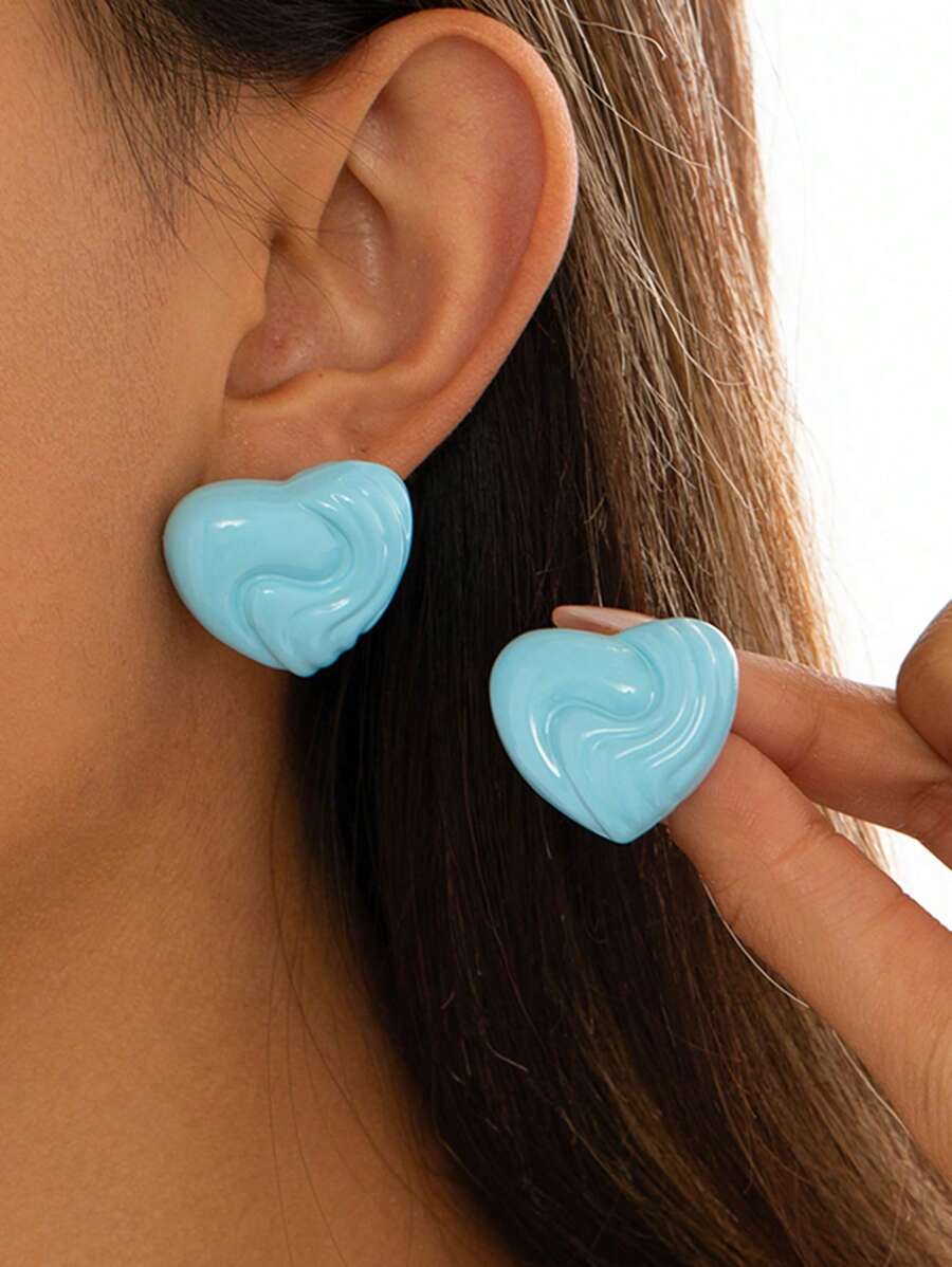 1 paire de boucles d'oreilles élégantes au design géométrique texturé, forme de cœur abstraite. Clips d'oreille polyvalents
