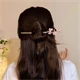 Grampo de cabelo em flor de cerejeira