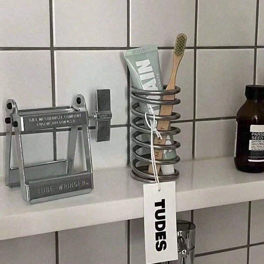 1 pièce Porte-brosse à dents en acier inoxydable, Porte-brosse à dents avec égouttoir, Support de conception à ressort créative, Organisateur de décoration minimaliste, Porte-pinceau de maquillage, Organisateur d'ustensiles de cuisine, Boîte de rangement multifonction pour la maison