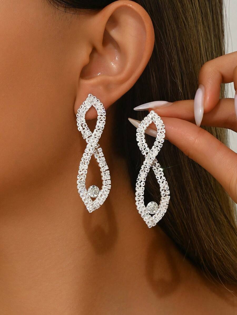 1 par de pendientes colgantes ovalados y huecos con cristales, estilo europeo y americano, para combinar con vestidos formales para mujer