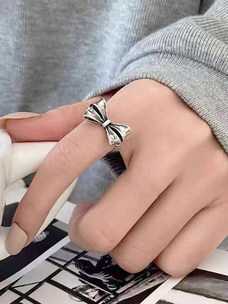 1 pieza Anillo con flor hueca y lazo, adecuado para uso diario para mujeres
