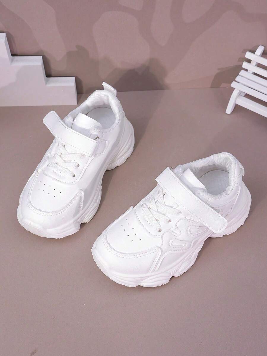 1 par de zapatillas deportivas casuales de suela gruesa con cierre de gancho y lazo, de unicolor, livianas y cómodas, adecuadas para uso diario escolar/de ocio, para niños