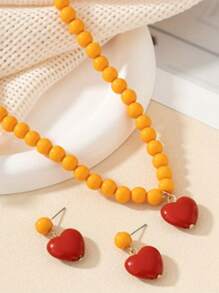 Orange Beads + Red Heart