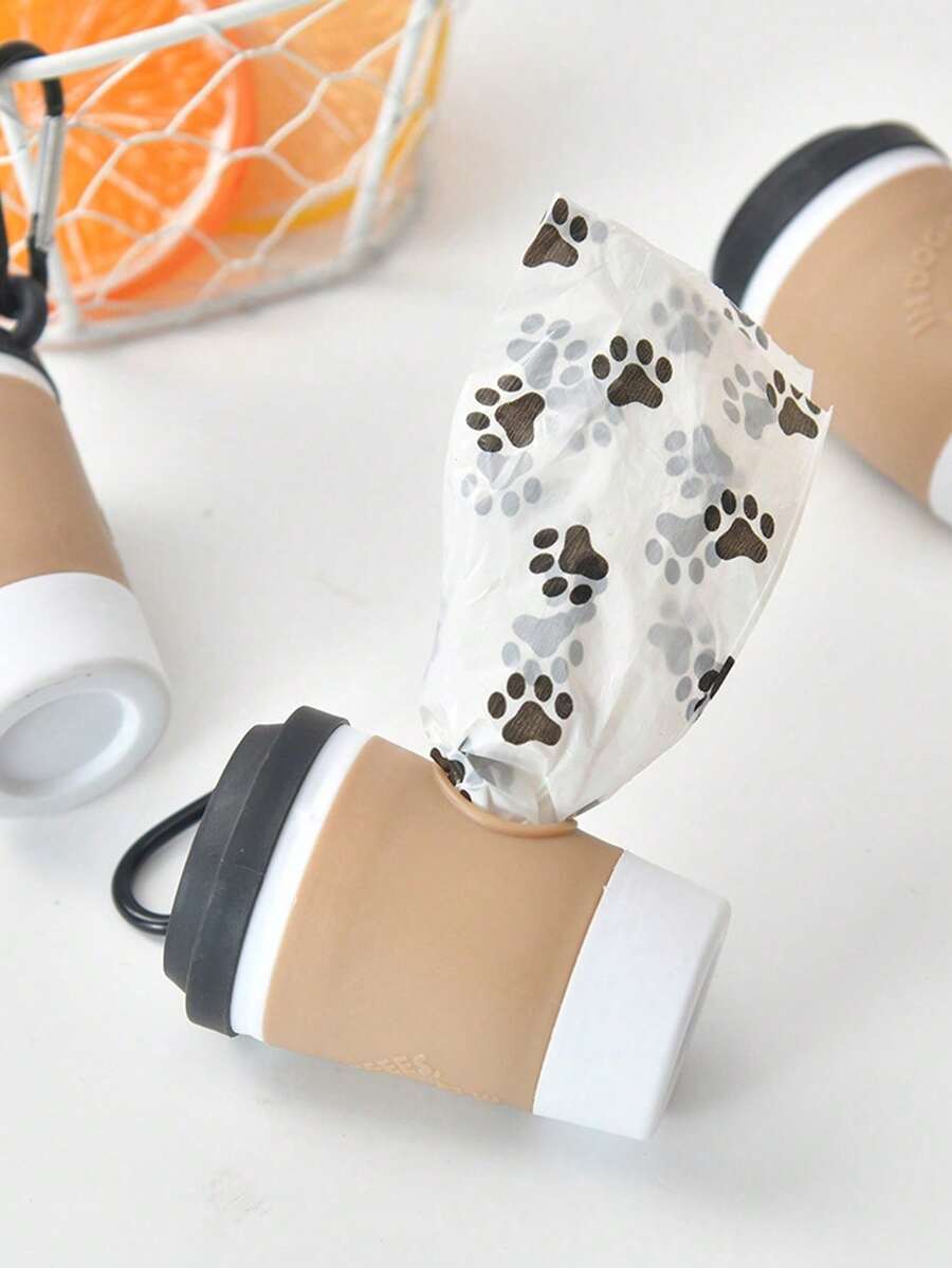 Nouveau distributeur de sacs à déchets pour animaux de compagnie, style tasse de café. Élégant et pratique pour ranger les sacs à déchets de chien. Fournitures pour animaux de compagnie