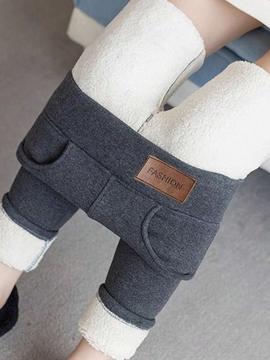 1 pieza Leggings cómodos y abrigados de plumón para la nieve, leggings casuales elásticos con bolsillos, de cintura alta, ropa de mujer