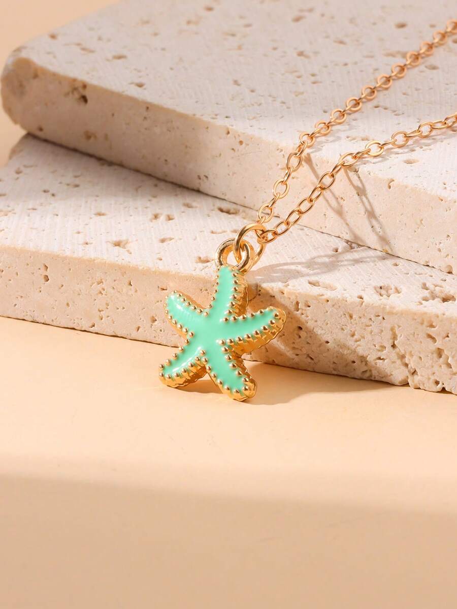 1 pieza Collar colgante con dije de estrella de mar elegante para mujer - Metalizado dorado con dije de estrella de mar azul brillante, adecuado para fiestas, cumpleaños y regalos de festivales de primavera, accesorio versátil con temática oceánica, artesanía exquisita