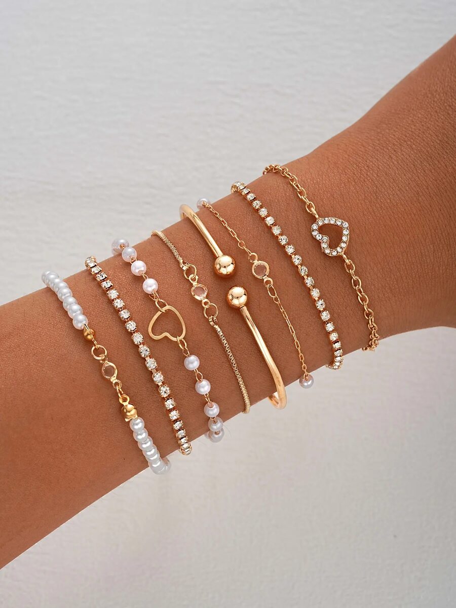 Conjunto de 12 piezas/6 piezas de pulseras superpuestas con diseño de corazón hueco de perlas falsas elegantes, joyería de moda para niñas, apropiado para uso diario en verano