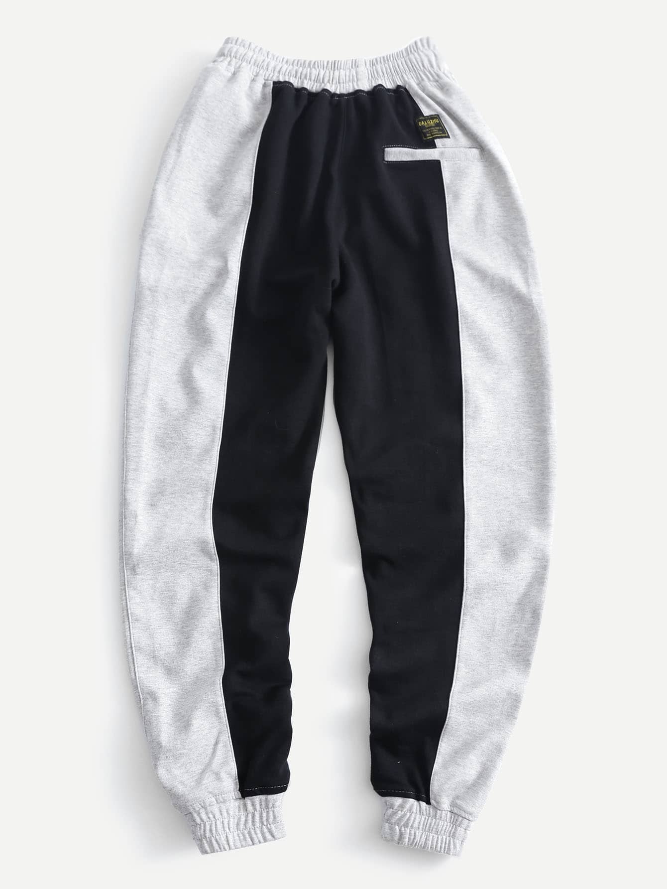 Es Esto Lo Nuevo de Pantalones deportivos de hombres de dos colores con  cordón ?? | ROMWE