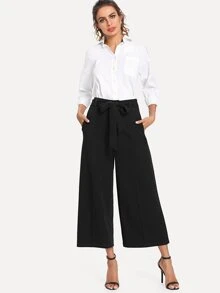 SHEIN Pantalones anchos tobilleros con lazo en la cintura y bolsillos