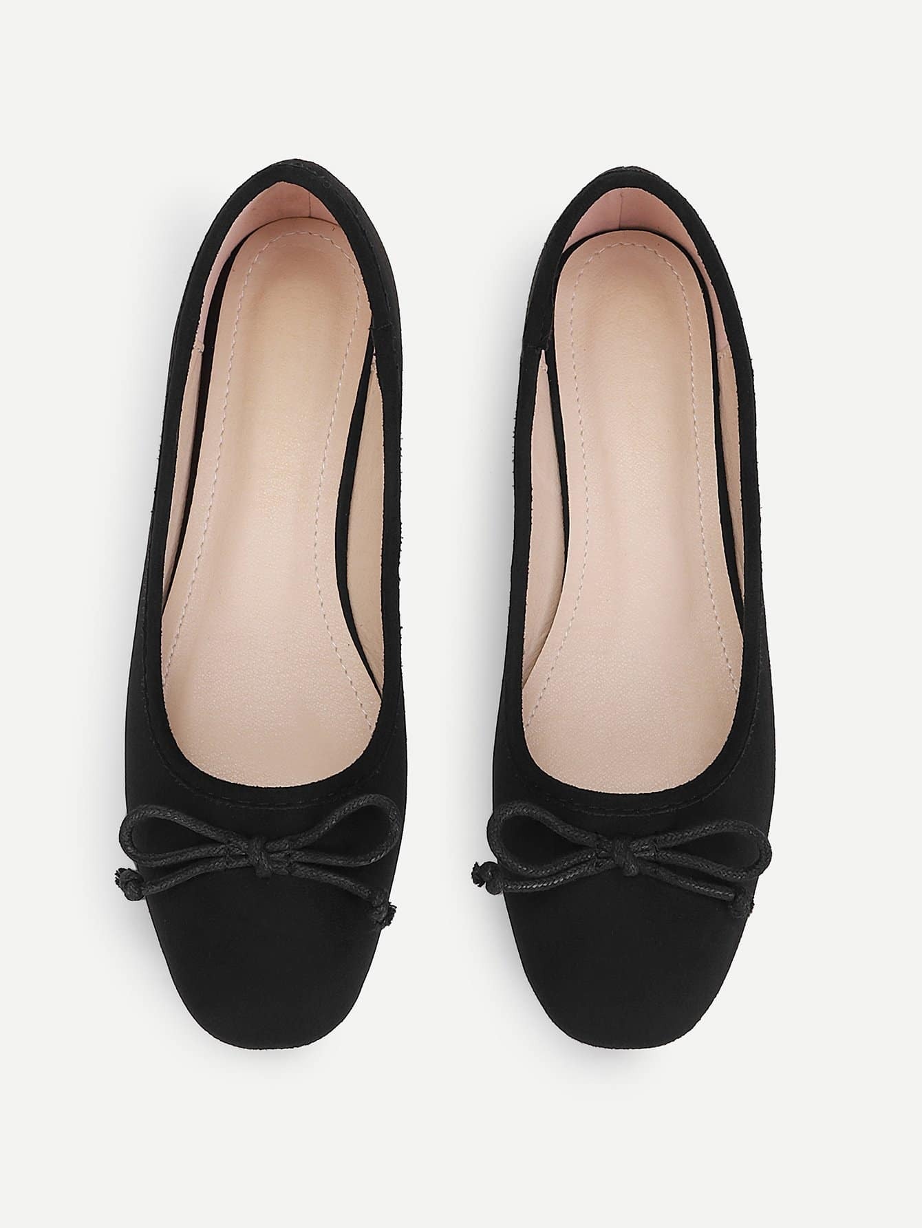 bow decorated ballet flats