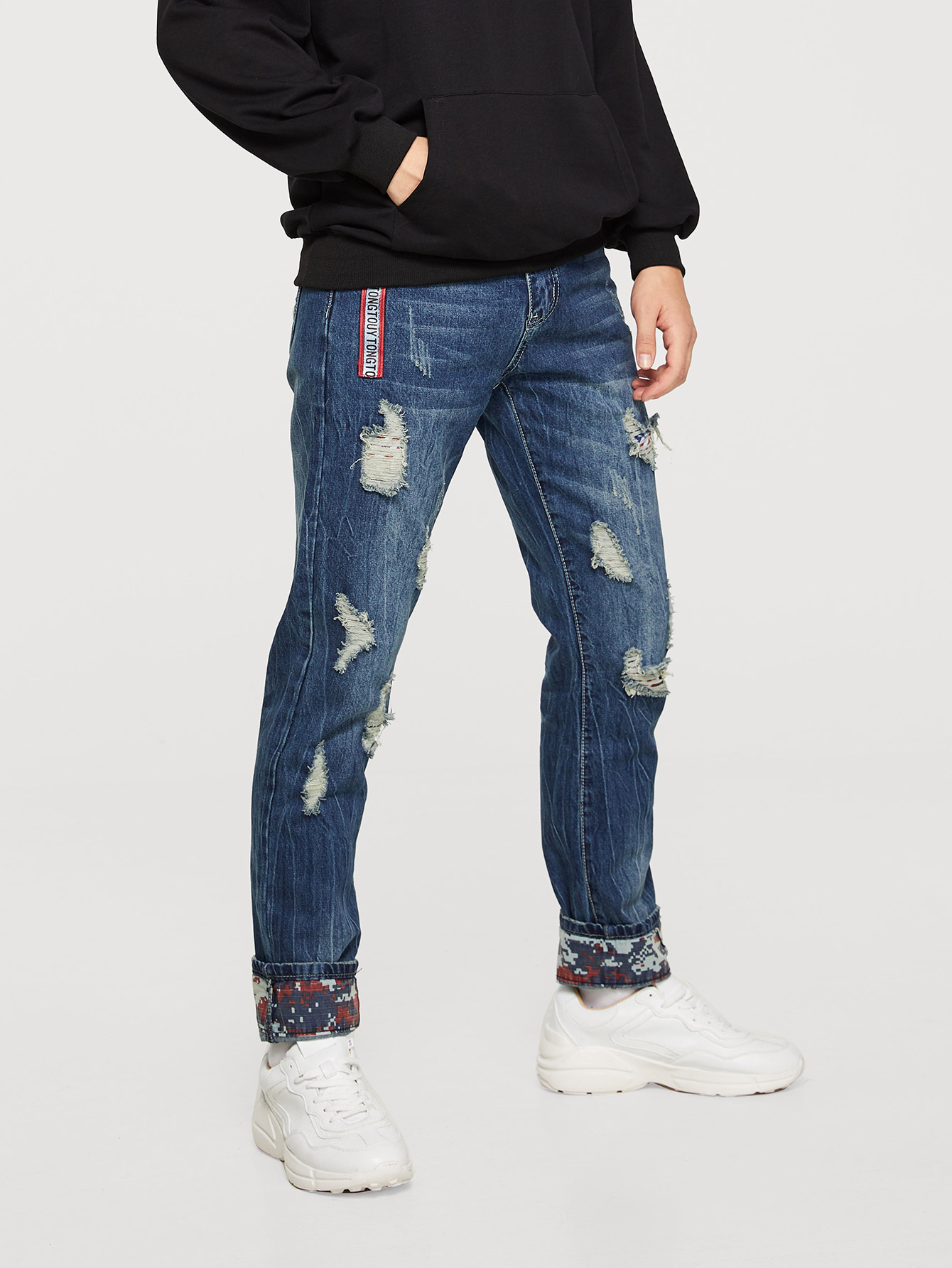 men tape detail rolled hem destroyed jeans