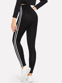 SHEIN MOOSTA Legging met witte zijstrepen en elastische taille