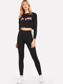 SHEIN MOOSTA Legging met witte zijstrepen en elastische taille