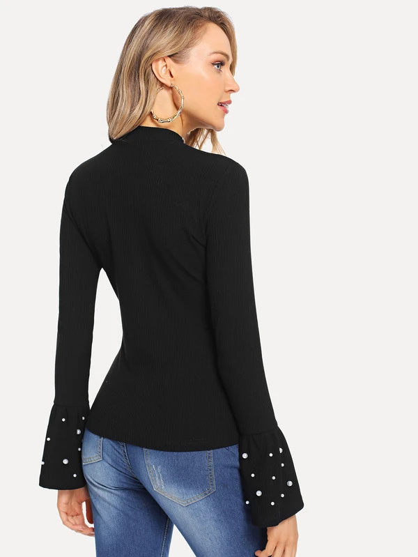 maglie con maniche a campana