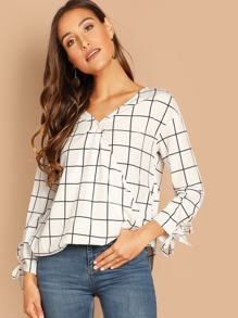 Bowed Cuff Curved Hem Surplice Wrap Blouse