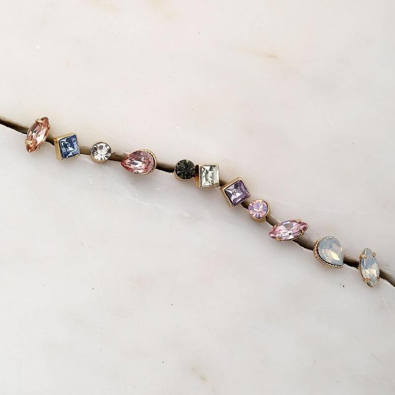 

Fifteen Pairs Of Colored Crystal Stud Earrings, Multicolor